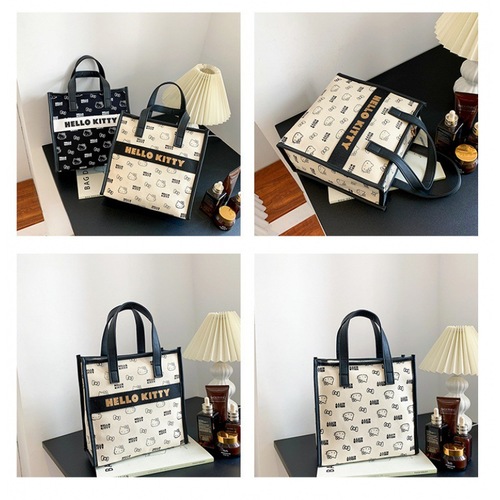 HelloKitty genuine new canvas portable toiletry bag cosmetic bag large capacity tote bag mommy bag women's bag