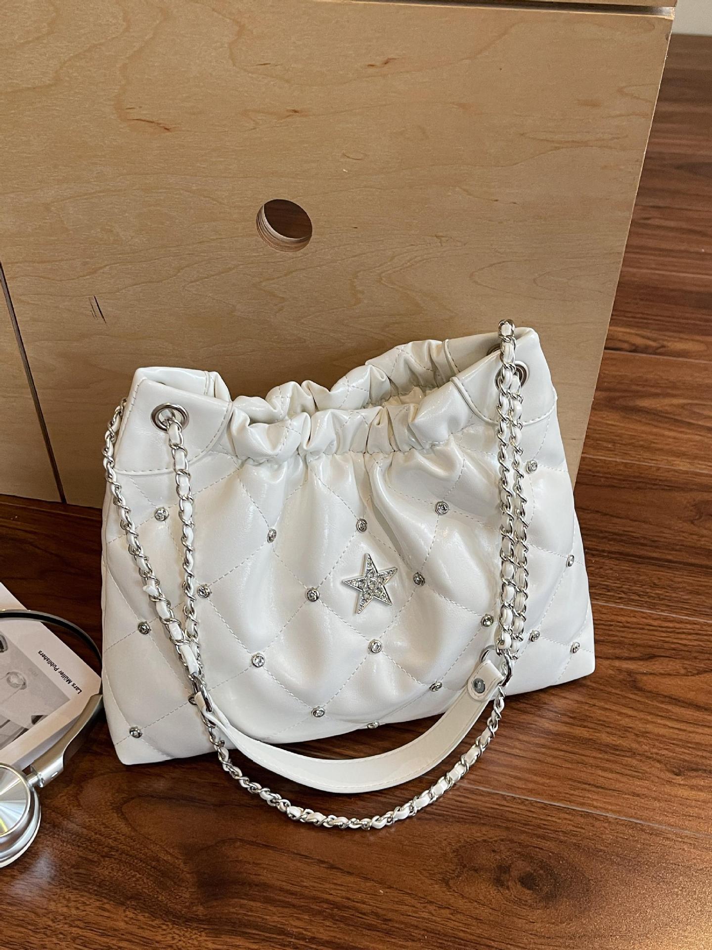 Venta caliente transfronteriza bolso de cubo de cadena de diamantes para mujer 2025 nuevo bolso de hombro casual de todo fósforo bolso de alta capacidad