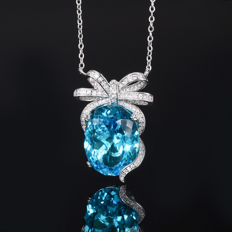 Otoño e invierno nuevo estilo Zhuang Shengsheng joyería simulación nido de pájaro corte de mar azul arco traje de temperamento 15*20