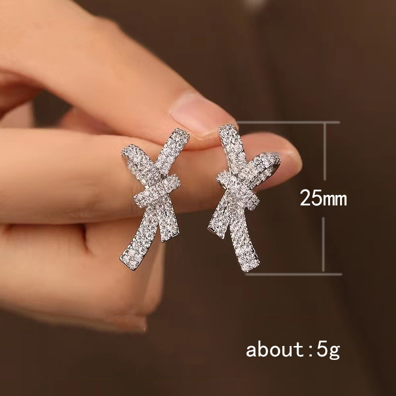 1 Pair Elegant Shiny Bow Knot Inlay Copper Zircon Ear Studs display picture 1