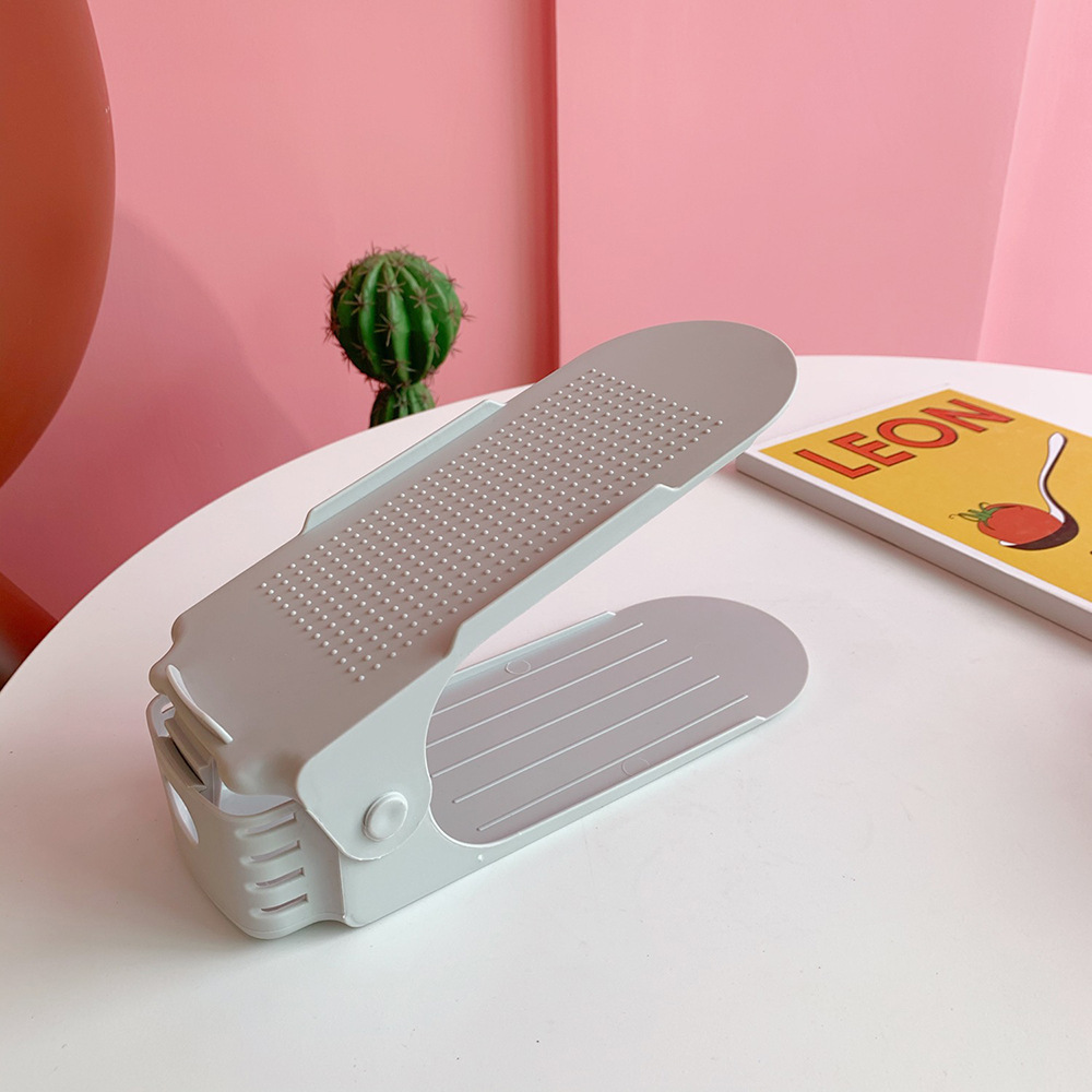 Nuevo estante de zapatos de almacenamiento simple, estante de zapatos plegable simple, estante de zapatos ajustable de plástico de doble capa integrado