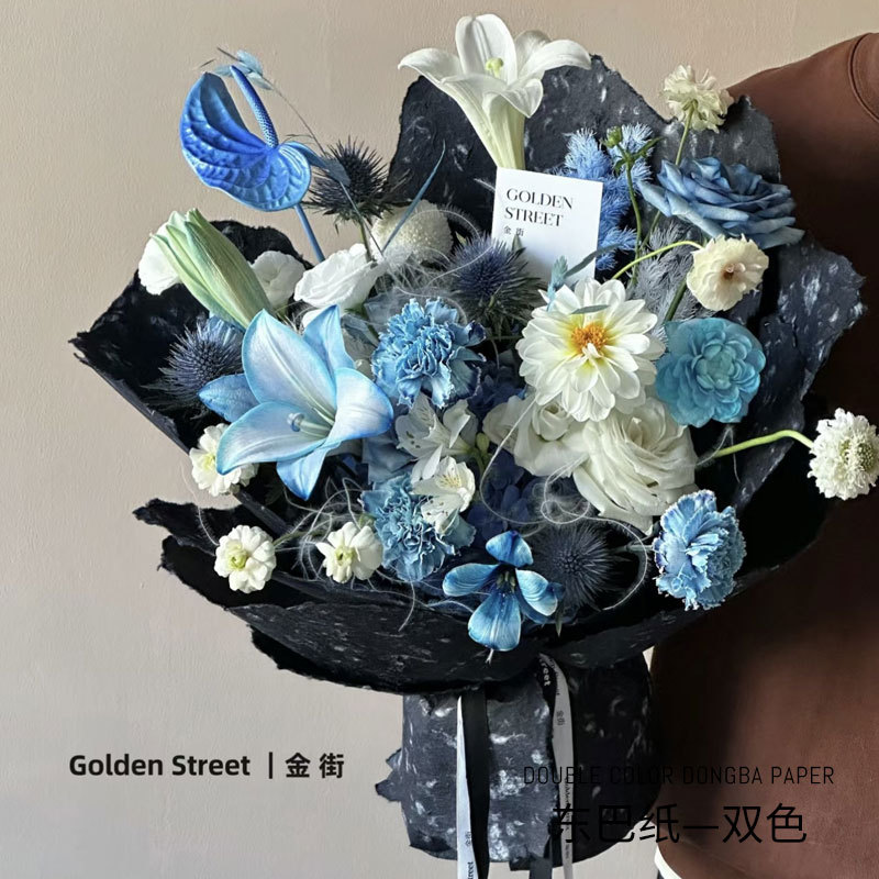 Huaxi día de San Valentín de dos colores mano rasgada Dongba papel retro textura de piedra flor de papel de embalaje floral paquete floral