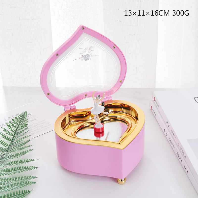 Caja de música de punto de pulsación de niña con corazón de melocotón rosa