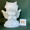 The new angel holds 21cm in hand