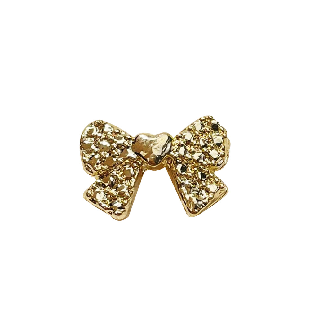 retro nail decoration with bow