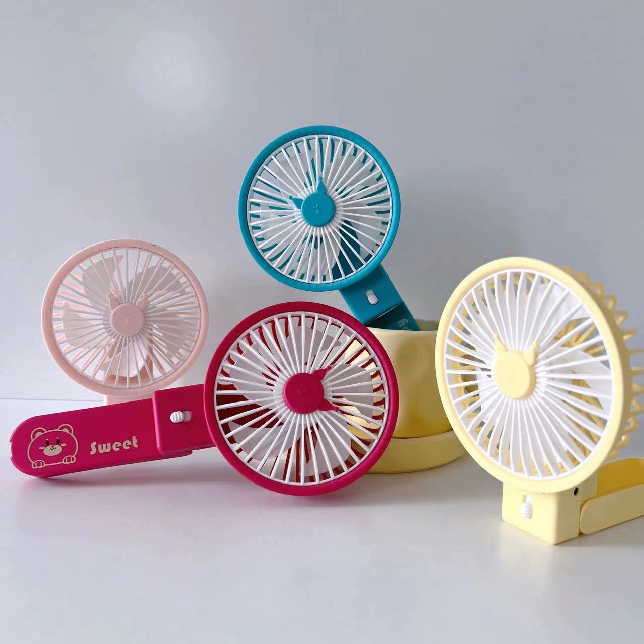 Small handheld folding portable air fan for students, new collection