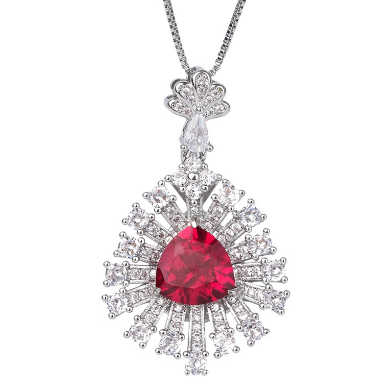 Zhuang sheng joyería europea y americana retro simulación colorido tesoro grasa triángulo hueco con incrustaciones de temperamento colgante collar 10*10