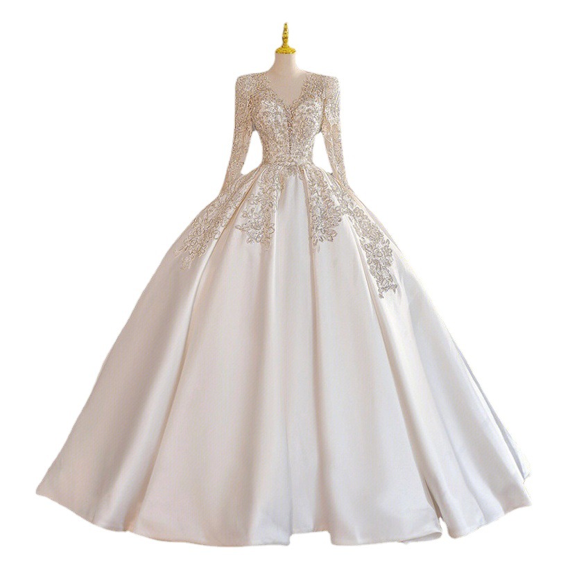 Vestido de novia estilo francés 2026, nuevo modelo, manga larga, bordado intenso, cuello en V, satén, estilo corte, largo hasta el suelo. image 1