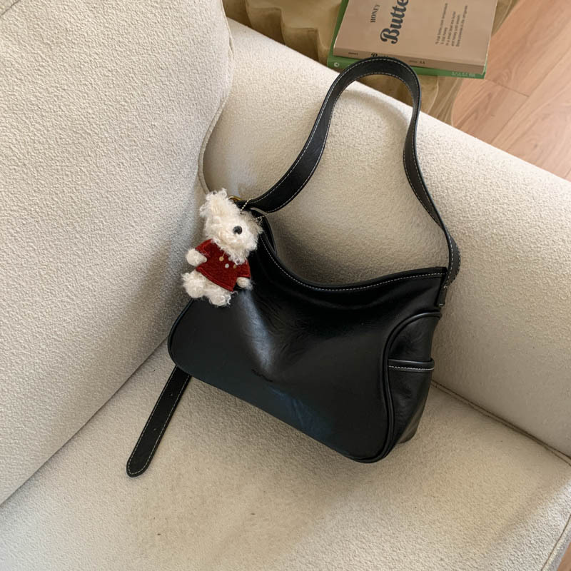 Coreano de cuero suave de alto nivel de hombro bolso de brazo para mujeres 2025 nueva bolsa de transporte de viaje bolsa casual versátil mochila