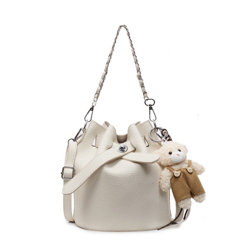 2025 nuevo estilo estilo caliente bolso de cubo coreano bolso de hombro de alto valor para mujer bolso de mensajero simple casual de todo fósforo