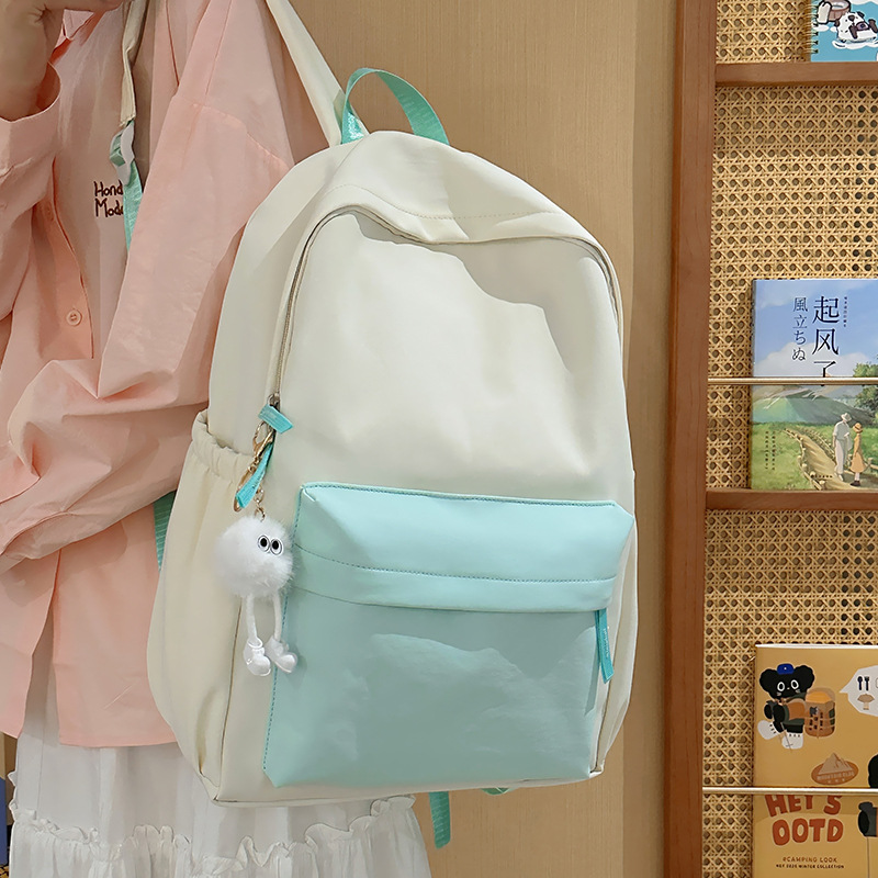 Large-capacity backpack for female junior high school students, girls' forest-style versatile color-blocking backpack for high school and college students, stylish design backpack