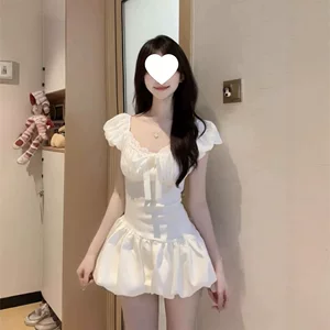 法式初恋少女感白色泡泡袖连衣裙女修身设计感蝴蝶结花苞短裙夏季
