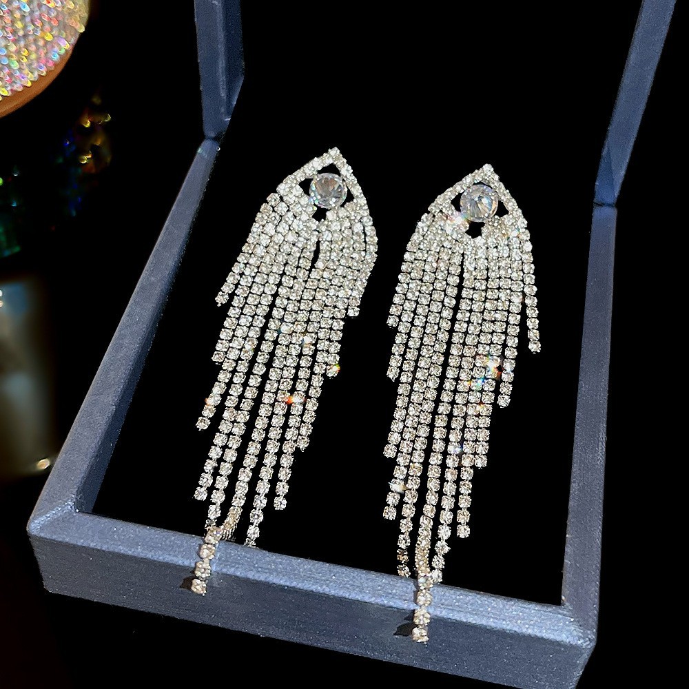 S925 aguja de plata elegante borla pendientes de alta gama simple cara de adelgazamiento pendientes de todo fósforo estilo coreano nuevos pendientes de moda al por mayor