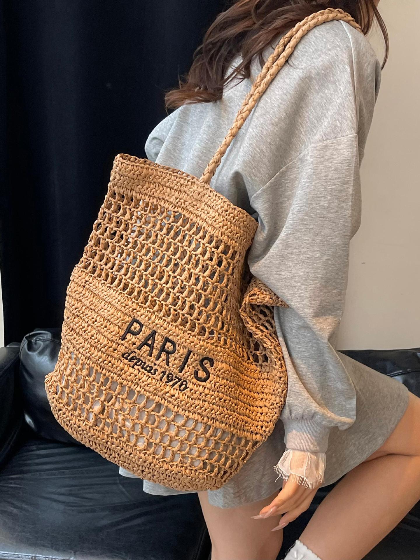 Bolso tejido de paja de moda casual para damas de gran capacidad 2025 nuevo bolso de hombro hueco tejido coreano bolso de playa