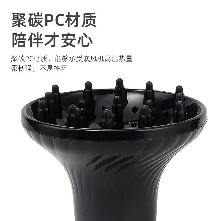電気ドライヤーの風カバーがカールを吹いています。|undefined