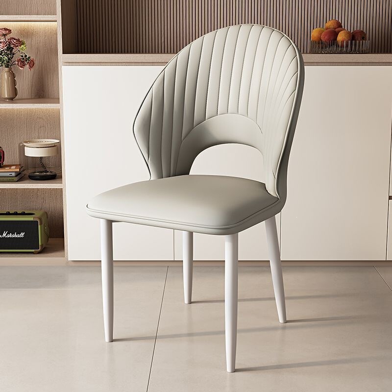Nordic light luxury soft-upholstered dining table and chairs, modern home comfort chair with backrest, scratch-resistant leather dining chair for hotels and guesthouses Nordic light luxury soft-upholstered dining table and chairs, modern home comfort chair with backrest, scratch-resistant leather dining chair for hotels and guesthouses