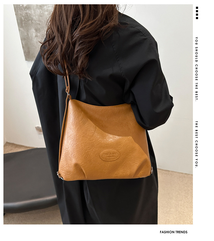 The 2024 new pleated tote bag is a large-capacity casual and fashionable backpack for women, featuring multi-functional texture and a single-shoulder crossbody bag details Picture