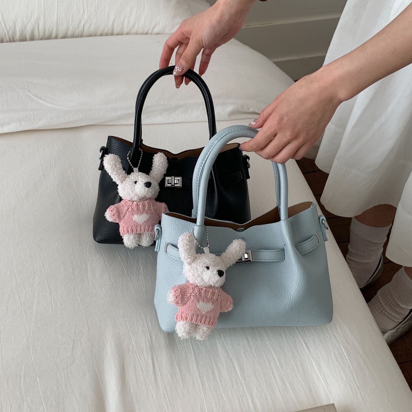 Simple portátil 2026 diseño de bolso de hombro único versátil estilo coreano de transporte de moda nuevo bolso de cubo nicho femenino