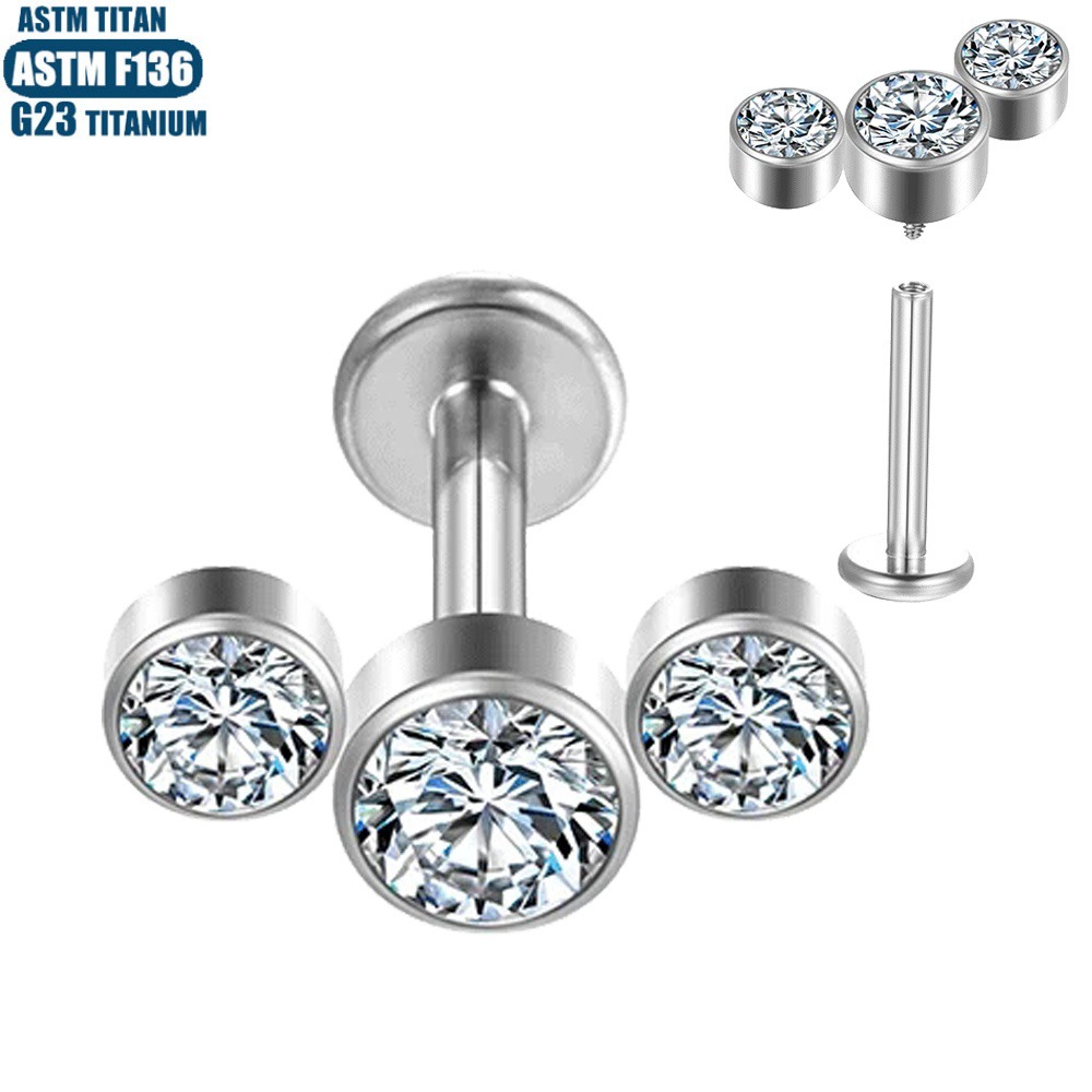 Silver pointed spike labret stud material detail