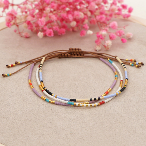 Bohemian style ins niche glass millet beads woven beads wholesale multi-layer stacked small women's bracelets