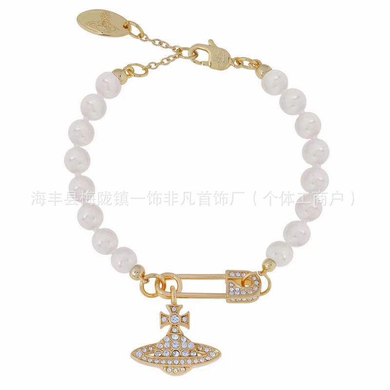 Golden pin, bracelet pearl