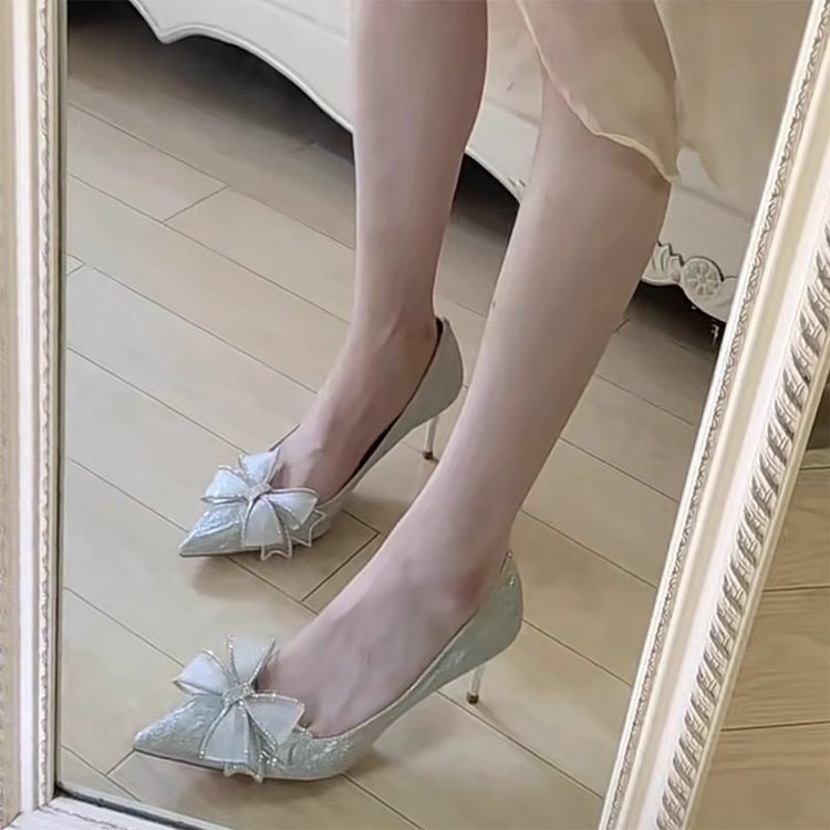 Silver wedding shoes with bow