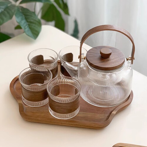High temperature resistant flower teapot set fruit boiling teapot household steaming integrated wooden handle glass vertical pattern teapot