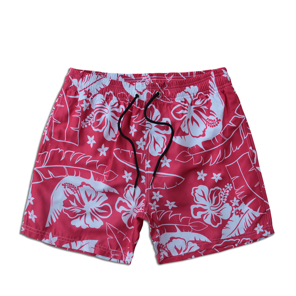 Herrbadeshorts med blommigt mönster och foder för stranden_voghion.com