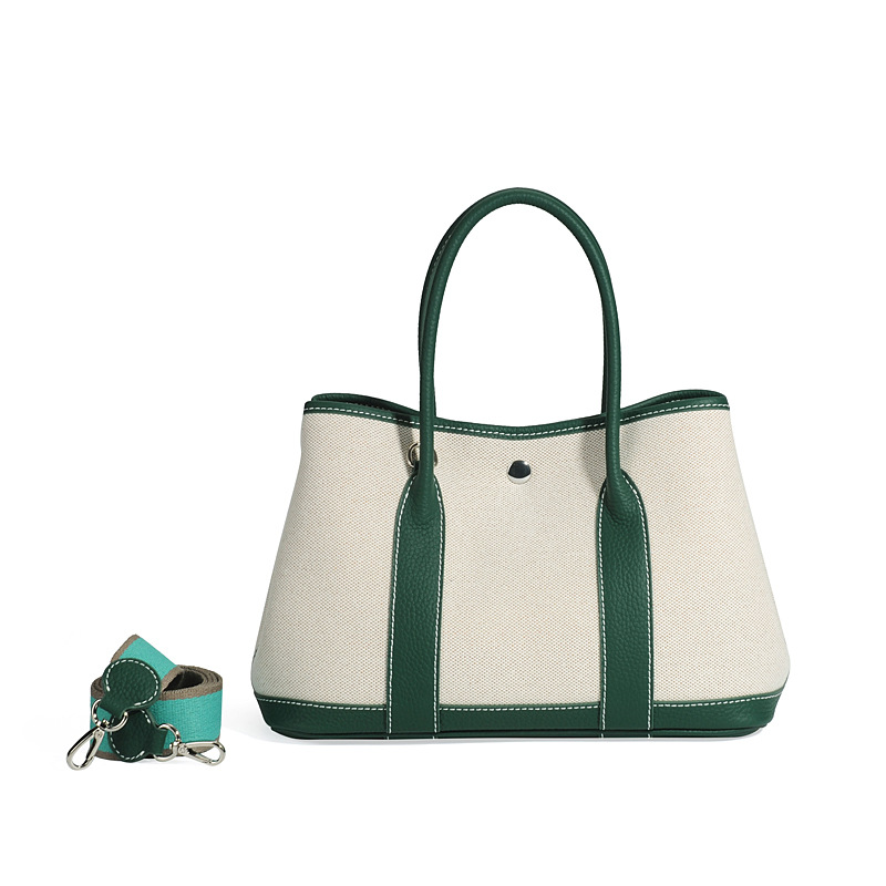 大容量ガーデンバッグキャンバスは色にぶつかった本革のトップ層牛革をつなぎ合わせて、シングル肩のショッピングバッグを持っています。