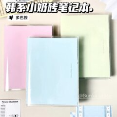 メーカー卸売A6の小さい粉のれんがのピンクのドーパミンの学生の高い顔の値の携帯で厚い手帳の横線のPUのノート