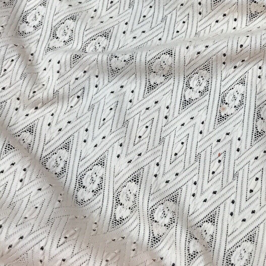 春夏季新款涤氨粗针网布弹力皱皱布针织面料女装童装布料欢迎议价