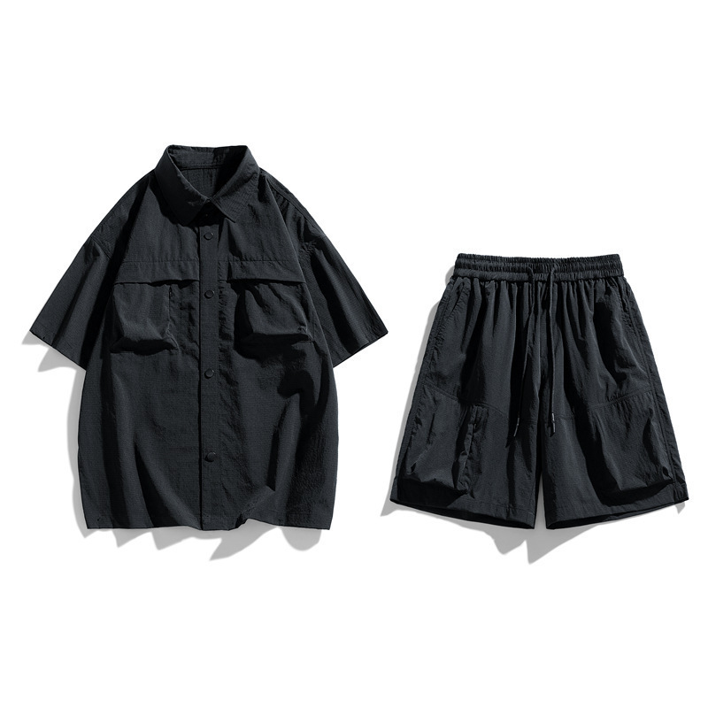 Trajes deportivos de moda masculinos de moda dos pantalones cortos de mangas cortas de verano sueltos y frescos al por mayor