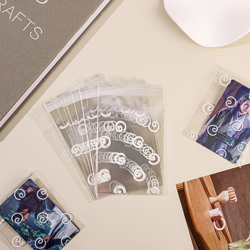 Spot de alto valor, estilo de círculo de tarjeta de viento de 50, una bolsa autoadhesiva, paquete opp, bolsa pequeña, lote de bolsa de embalaje