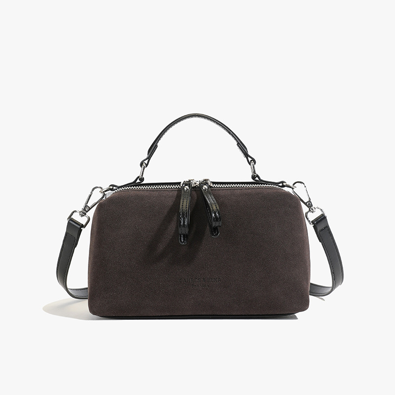 Invierno de moda mochila de textura esmerizada para mujeres 2025 nueva bolsa de hombro de mano casual de alta calidad sensación versátil mochila