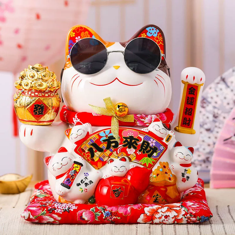7 -inch wealth cat ornament shakes hands.