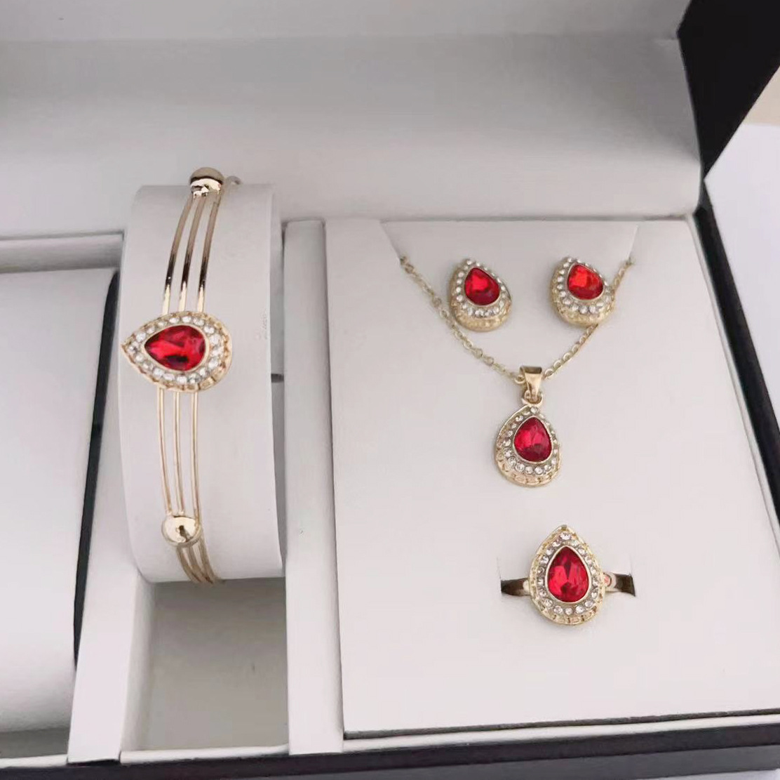 Europeo y americano transfronterizo nuevo collar traje exquisita aleación multicolor gota de agua collar pendientes joyería de cuatro piezas en stock