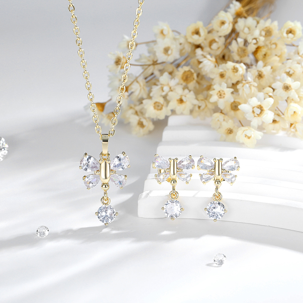 Transfronterizos de alto nivel sensación colgante mariposa conjunto de joyería de moda cobre 14K oro de color de cuentas de aretes de zircon collar