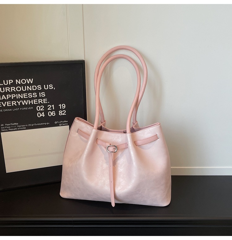 Nueva bolsa de hombro coreana para mujeres 2026 simple moda bolso de brazo para viajar al trabajo bolso de gran capacidad