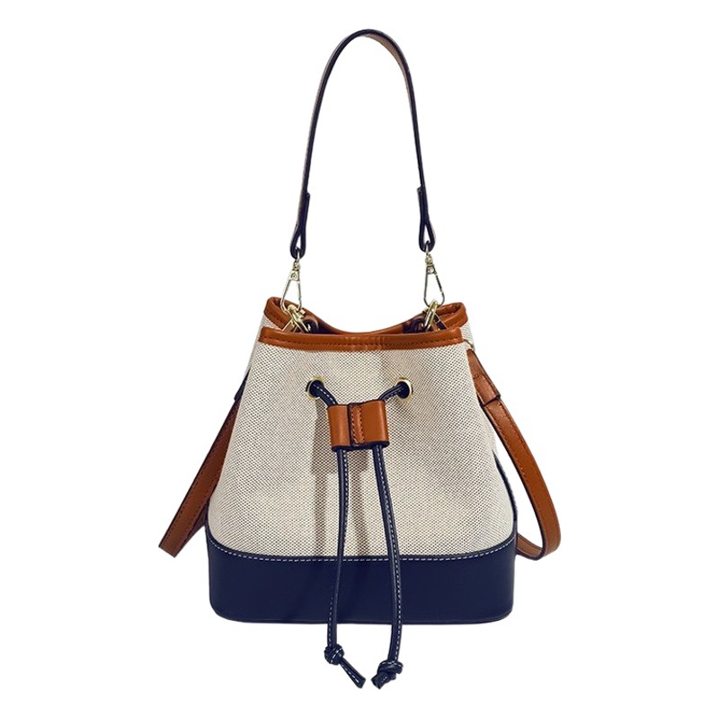 Bolso tote tipo cubo de lona con bloques de color para mujer, nuevo modelo de comercio exterior, bolso de hombro cruzado con cordón texturizado estilo moda urbana.