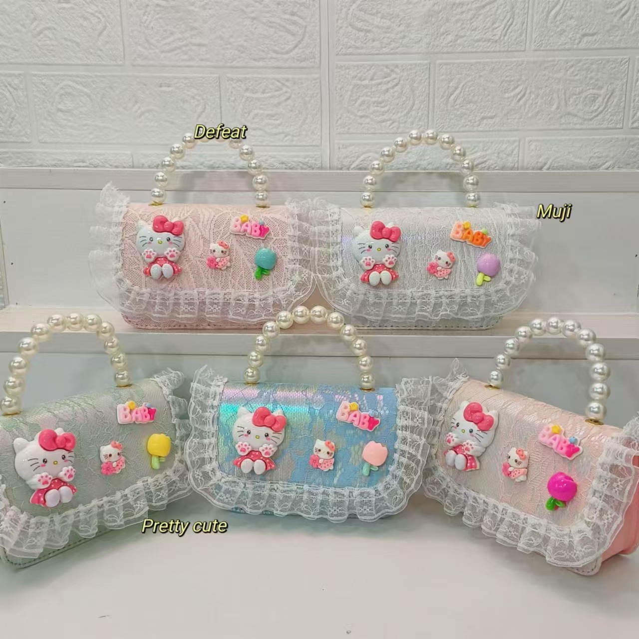 Cartoon KT feline bolso bolso de perla bolso de hombro mochila bolso de cambio bolso de cadena bolso pequeño bolso cuadrado bolso para niños