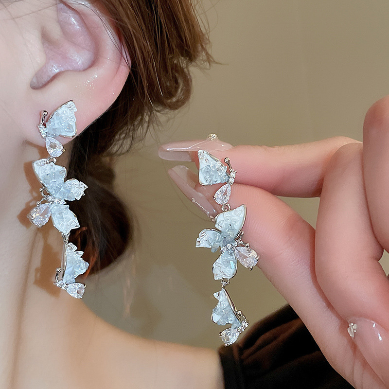 Aguja de plata, estilo de vacaciones azul, pendientes de lazo de flores suaves, pendientes de moda fresca, pendientes de ambiente dulce