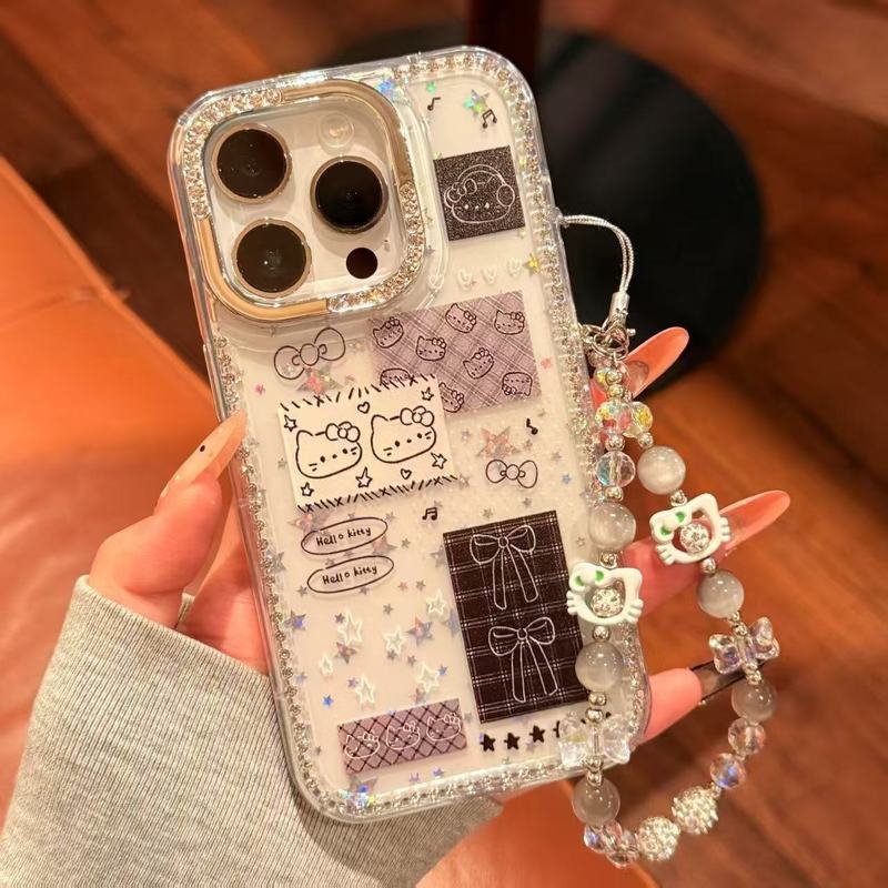 漫画かわいい KT 猫リボンコラージュラベル Apple 16promax 携帯電話ケース iphone15 ダイヤモンドがちりばめられています|undefined