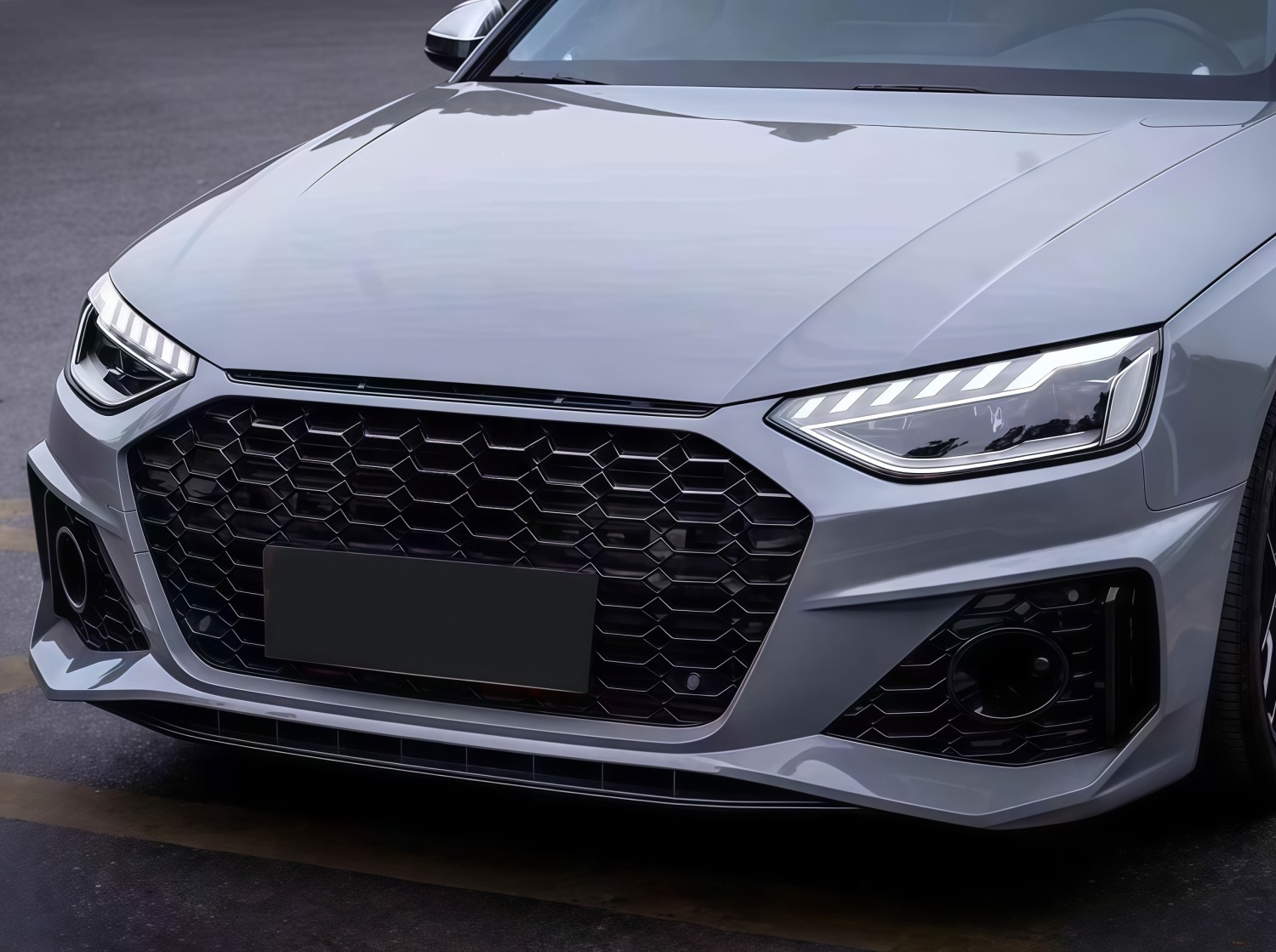 20-22 models suitable for Audi A4L, modified with an RS4-style front bumper, front grille, and front fascia