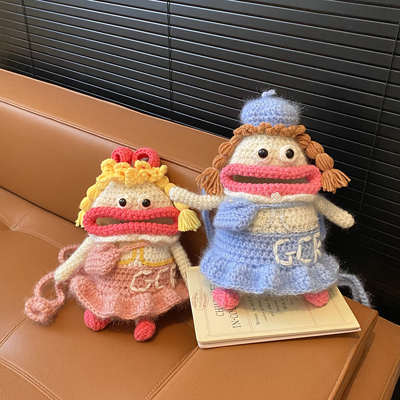 Otoño y invierno nuevo gancho de lana bolsas de niños divertidas extrañas bolsas de accesorios para bebés caricaturas bolsas de cambio para niños y niñas
