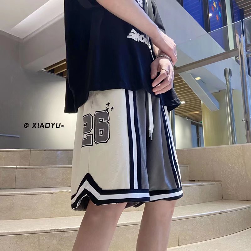 Nuevo estilo de marca compartida cintura pantalones cortos de filete de flores y frutas baloncesto casual para hombres tendencia deportes de cinco puntos pantalones sueltos estilo fino de verano