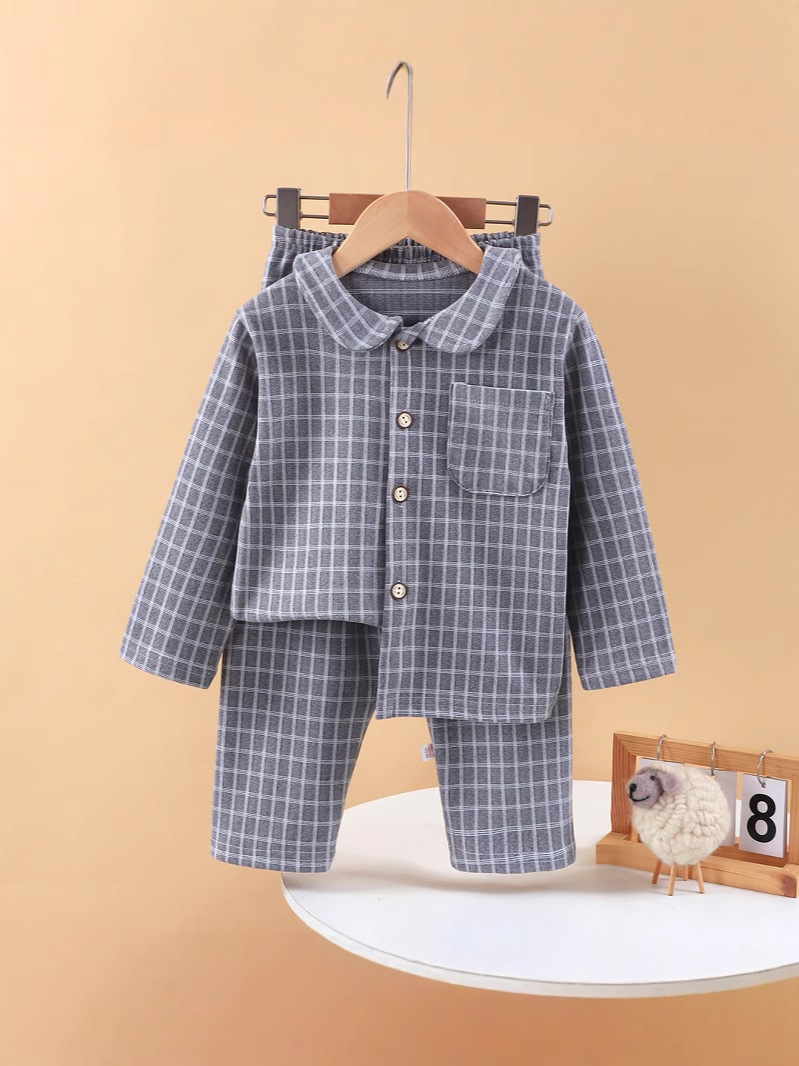Nuevos productos para niños de otoño y invierno cuadrado de manga larga pijamas sueltos cuadrados de camisa caliente para niños pijamas para el hogar