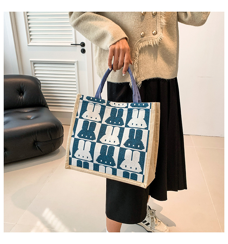 High-end mid-capacity canvas school commuting handbag 2024 new style fashionable and versatile linen single-shoulder tote bag undefined