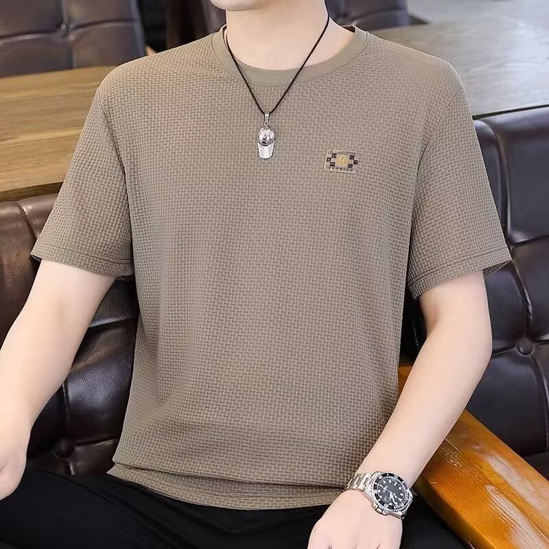 T-shirt de manga corta marca de moda masculina de verano suelta manga de cinco puntos 2026 nueva tendencia en línea in simple impresión superior