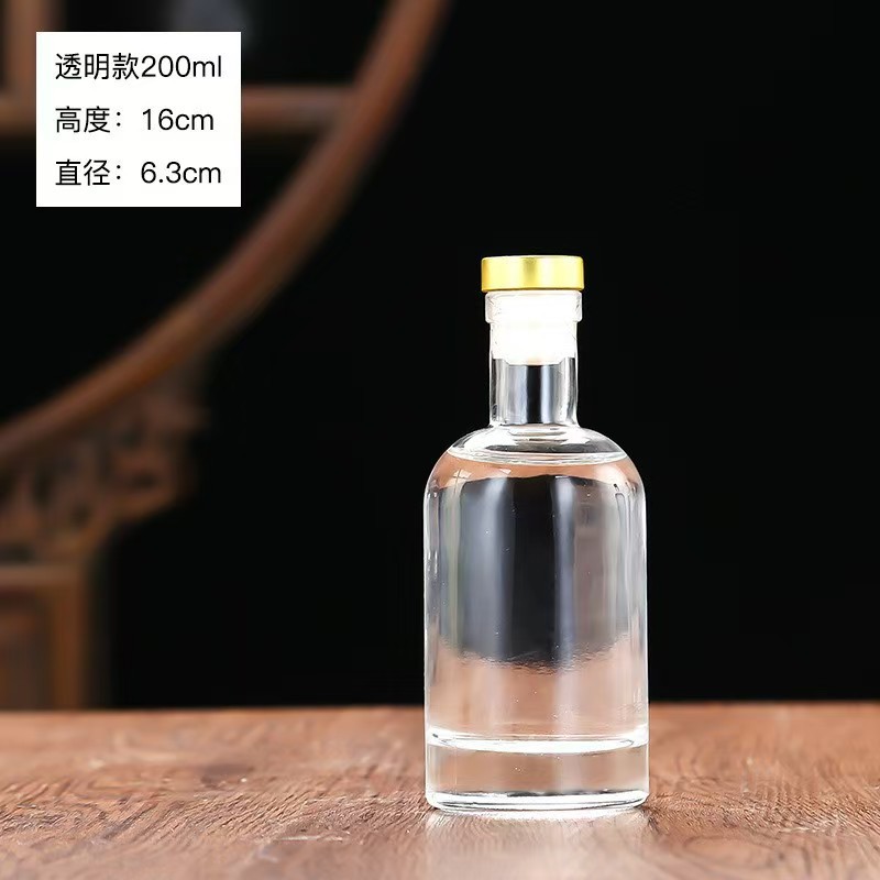 Botella de vidrio de vodka de alta calidad botella de vino de fruta cristal transparente de arena blanca dividida botella vacía con película de retracción térmica en stock