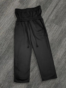 Spot europeo y americano pesado otoño e invierno 2025 principios de primavera doble cintura falso dos pantalones sueltos con cordón pantalones bordados al por mayor